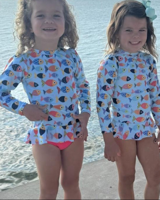 Cute toddler and children's swimwear. Matching sibling swim suit collections. UPF 50 Fabric. Made in the USA!
