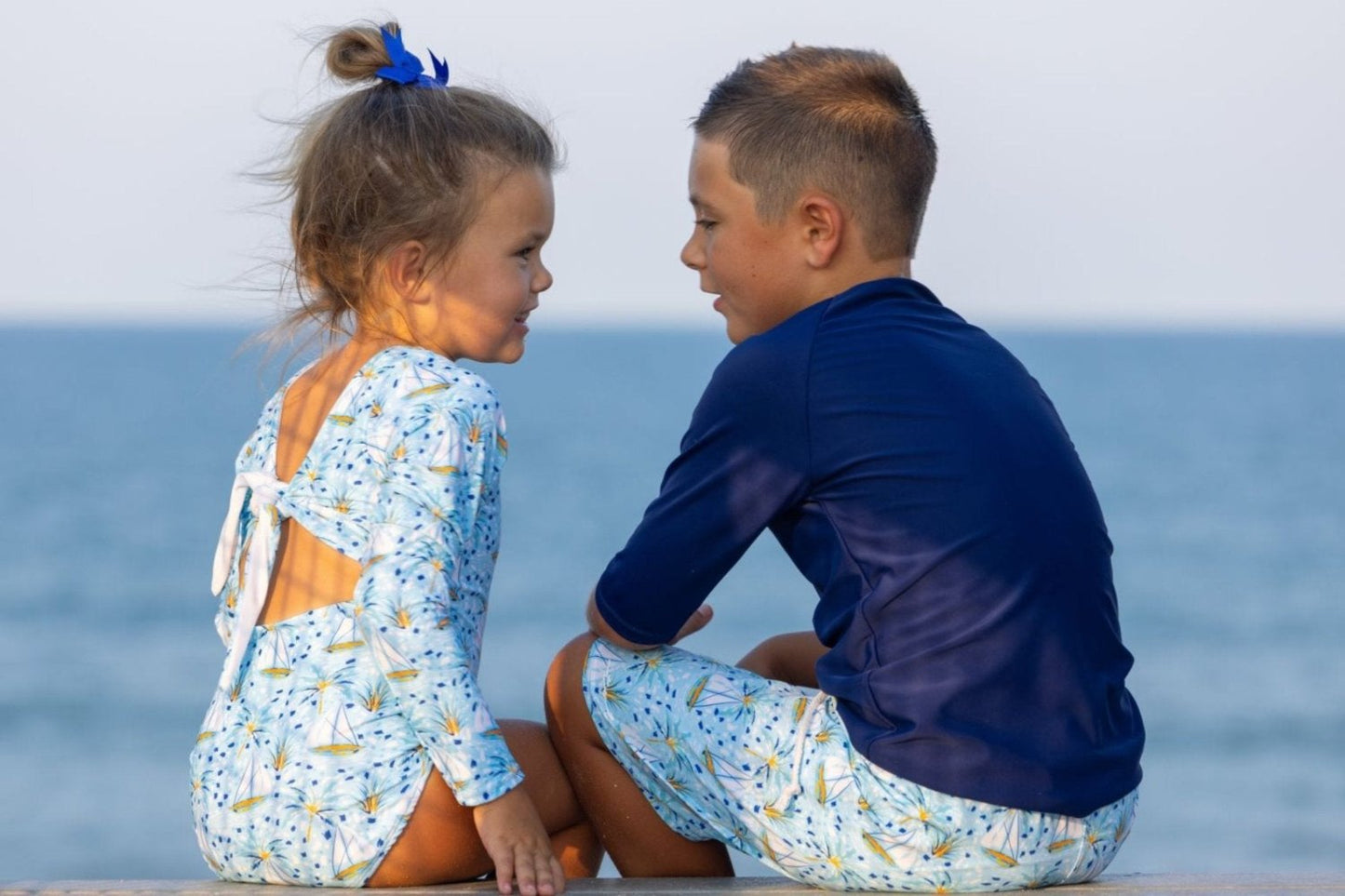 Cute toddler and children's swimwear. Matching sibling swim suit collections. UPF 50 Fabric. Made in the USA!