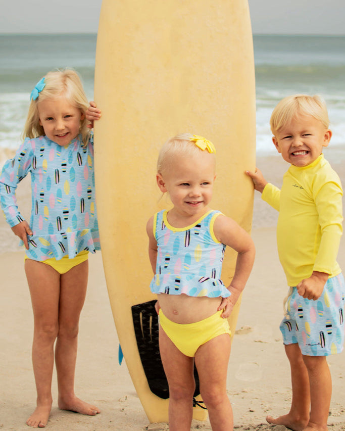 Cute toddler and children's swimwear. Matching sibling swim suit collections. UPF 50 Fabric. Made in the USA!
