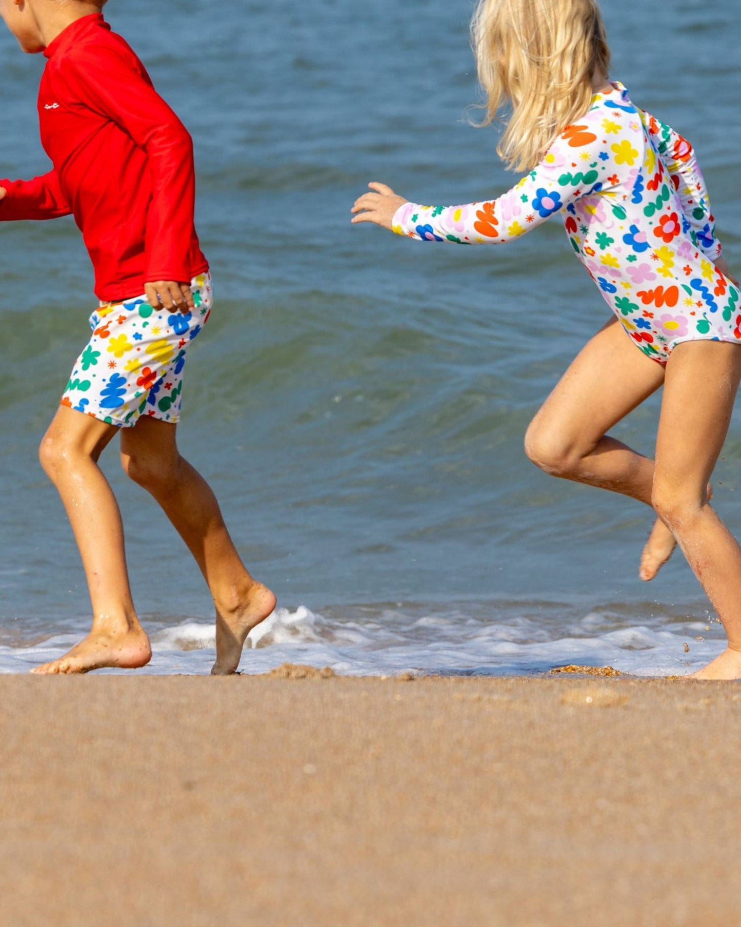 Cute toddler and children's swimwear. Matching sibling swim suit collections. UPF 50 Fabric. Made in the USA!