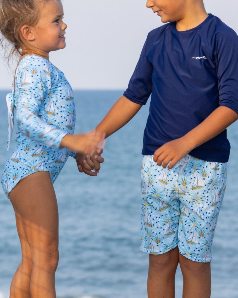 Cute toddler and children's swimwear. Matching sibling swim suit collections. UPF 50 Fabric. Made in the USA!