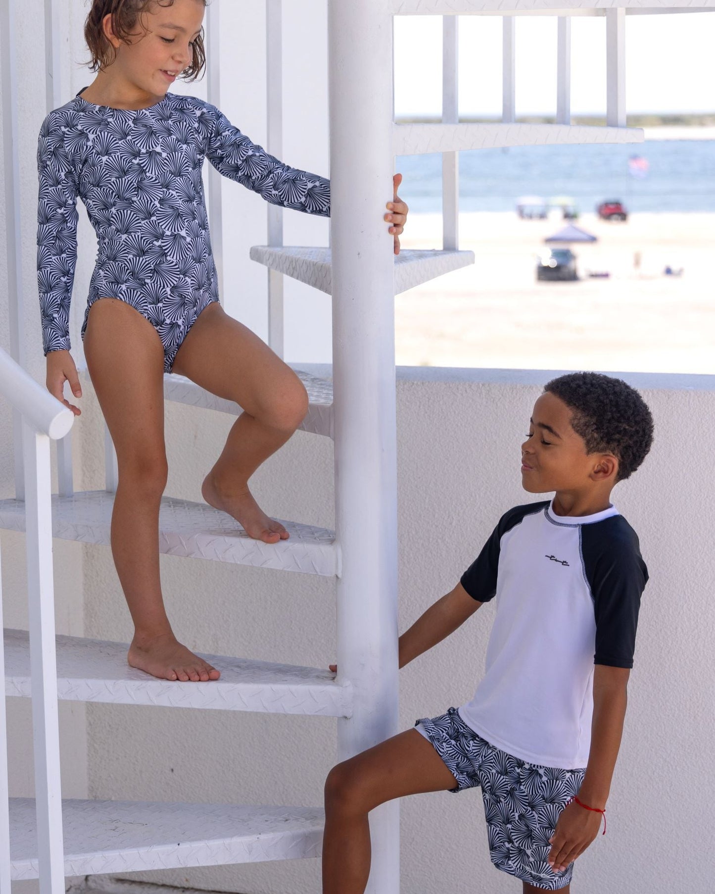Cute toddler and children's swimwear. Matching sibling swim suit collections. UPF 50 Fabric. Made in the USA!