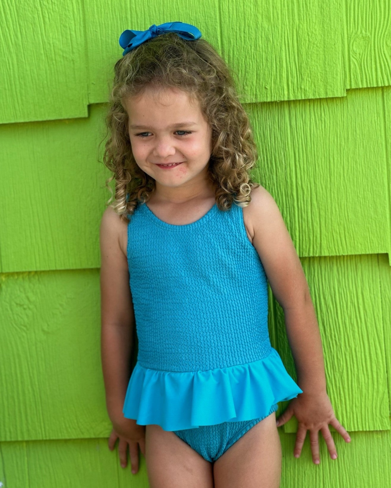Cute toddler and children's swimwear. Matching sibling swim suit collections. UPF 50 Fabric. Made in the USA!