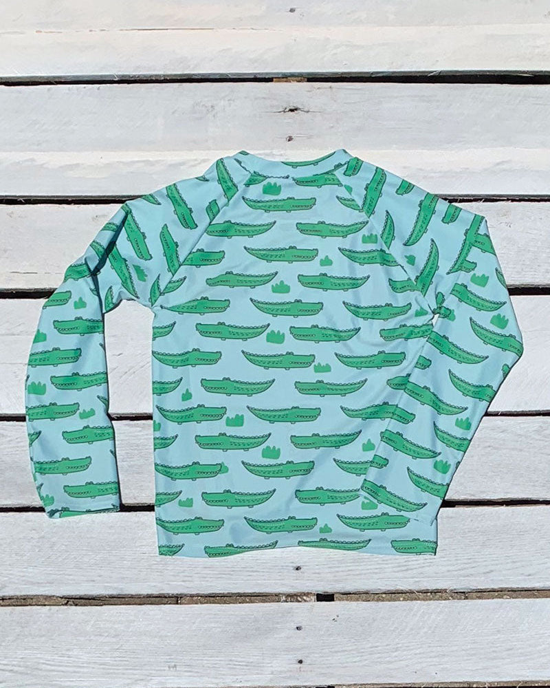 Cute toddler and children's swimwear. Matching sibling swim suit collections. UPF 50 Fabric. Made in the USA!