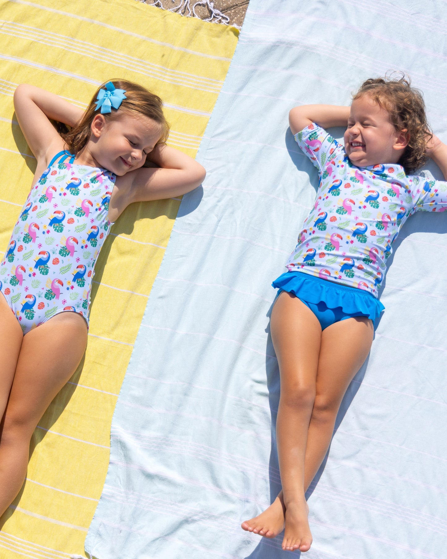 Cute toddler and children's swimwear. Matching sibling swim suit collections. UPF 50 Fabric. Made in the USA!