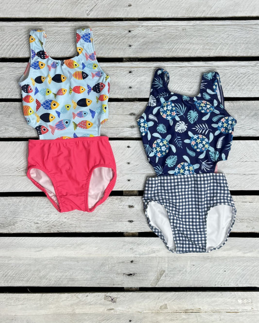 Cute toddler and children's swimwear. Matching sibling swim suit collections. UPF 50 Fabric. Made in the USA!