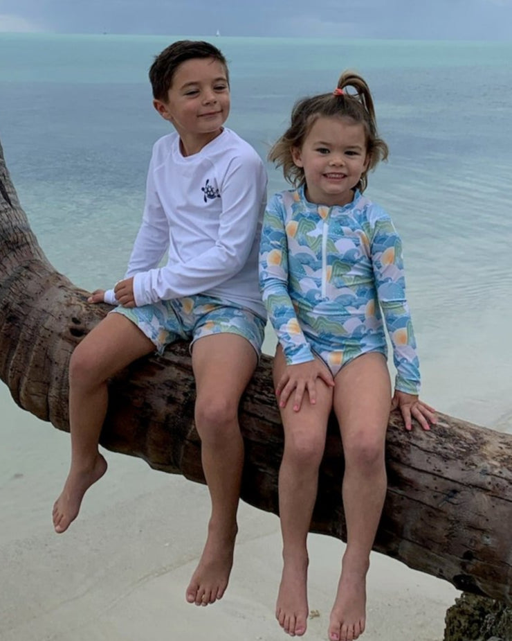 Cute toddler and children's swimwear. Matching sibling swim suit collections. UPF 50 Fabric. Made in the USA!