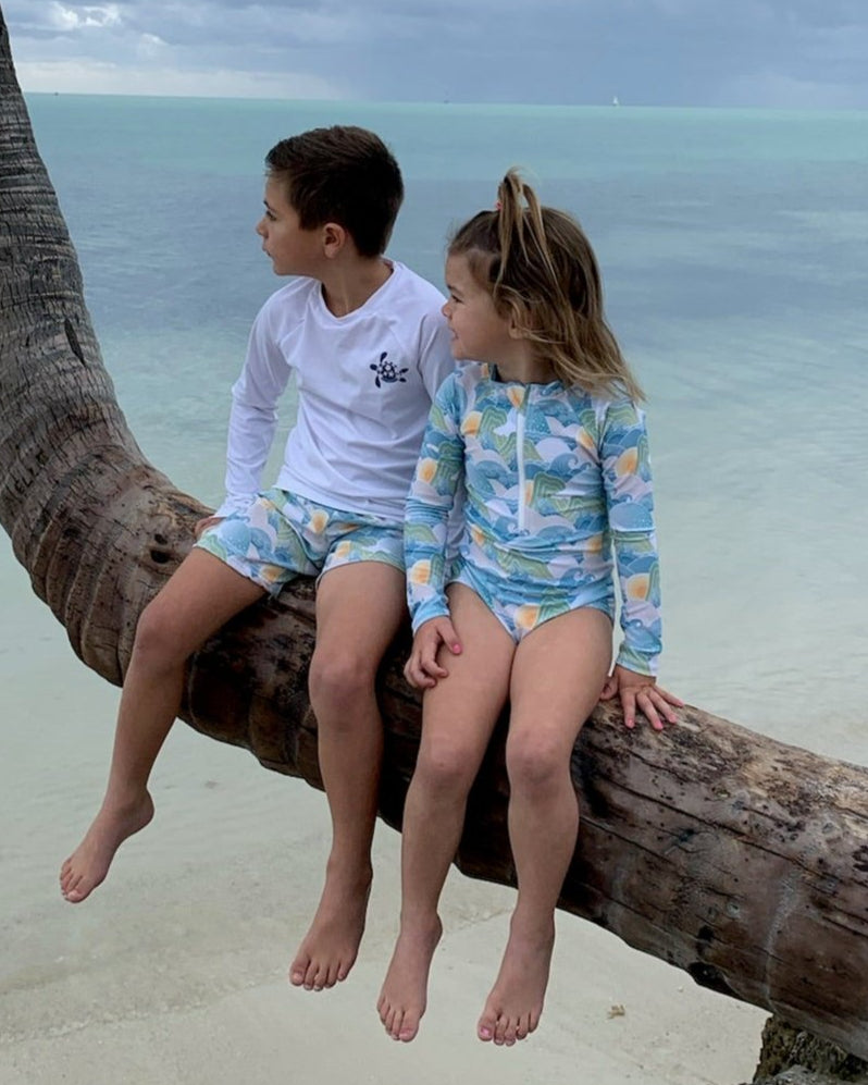 Cute toddler and children's swimwear. Matching sibling swim suit collections. UPF 50 Fabric. Made in the USA!
