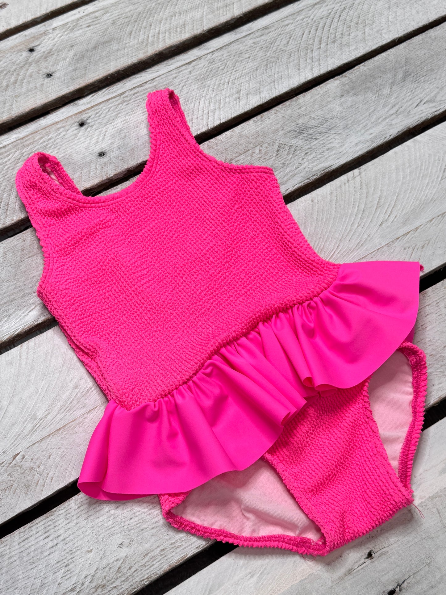Cute toddler and children's swimwear. Matching sibling swim suit collections. UPF 50 Fabric. Made in the USA!