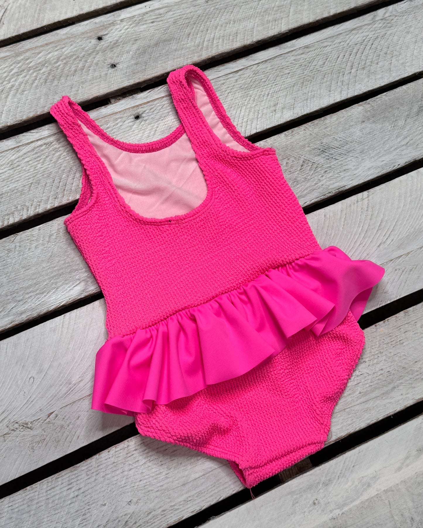 Cute toddler and children's swimwear. Matching sibling swim suit collections. UPF 50 Fabric. Made in the USA!