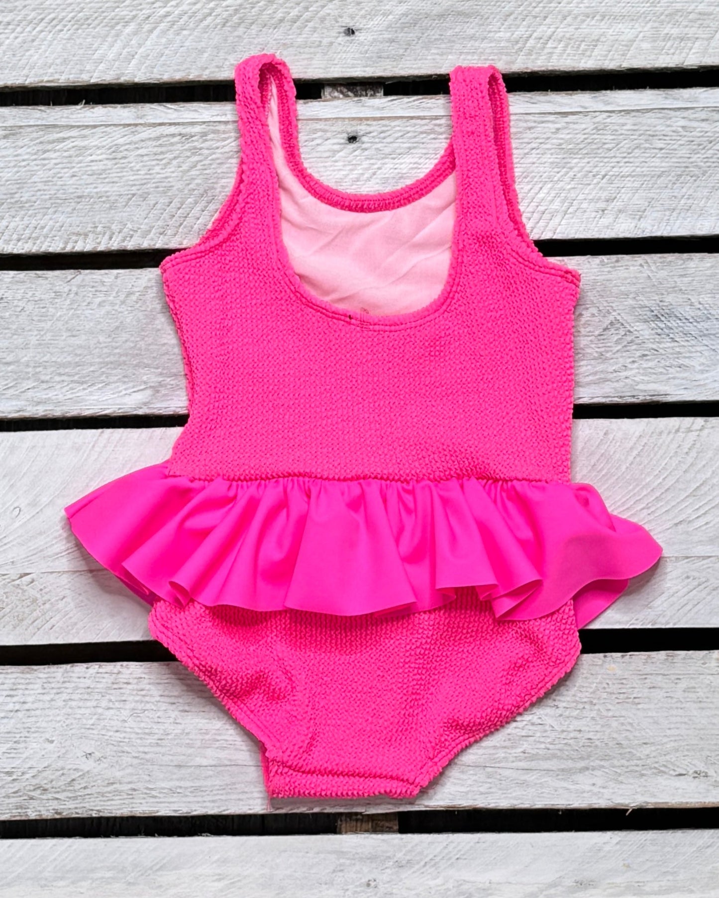 Cute toddler and children's swimwear. Matching sibling swim suit collections. UPF 50 Fabric. Made in the USA!