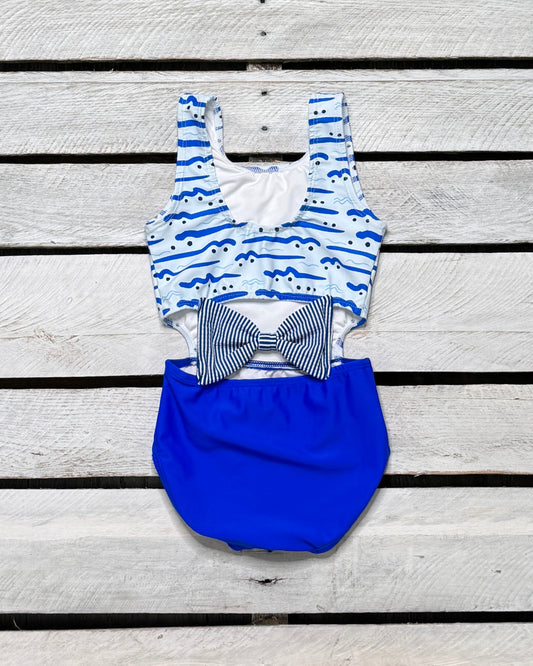 Cute toddler and children's swimwear. Matching sibling swim suit collections. UPF 50 Fabric. Made in the USA!