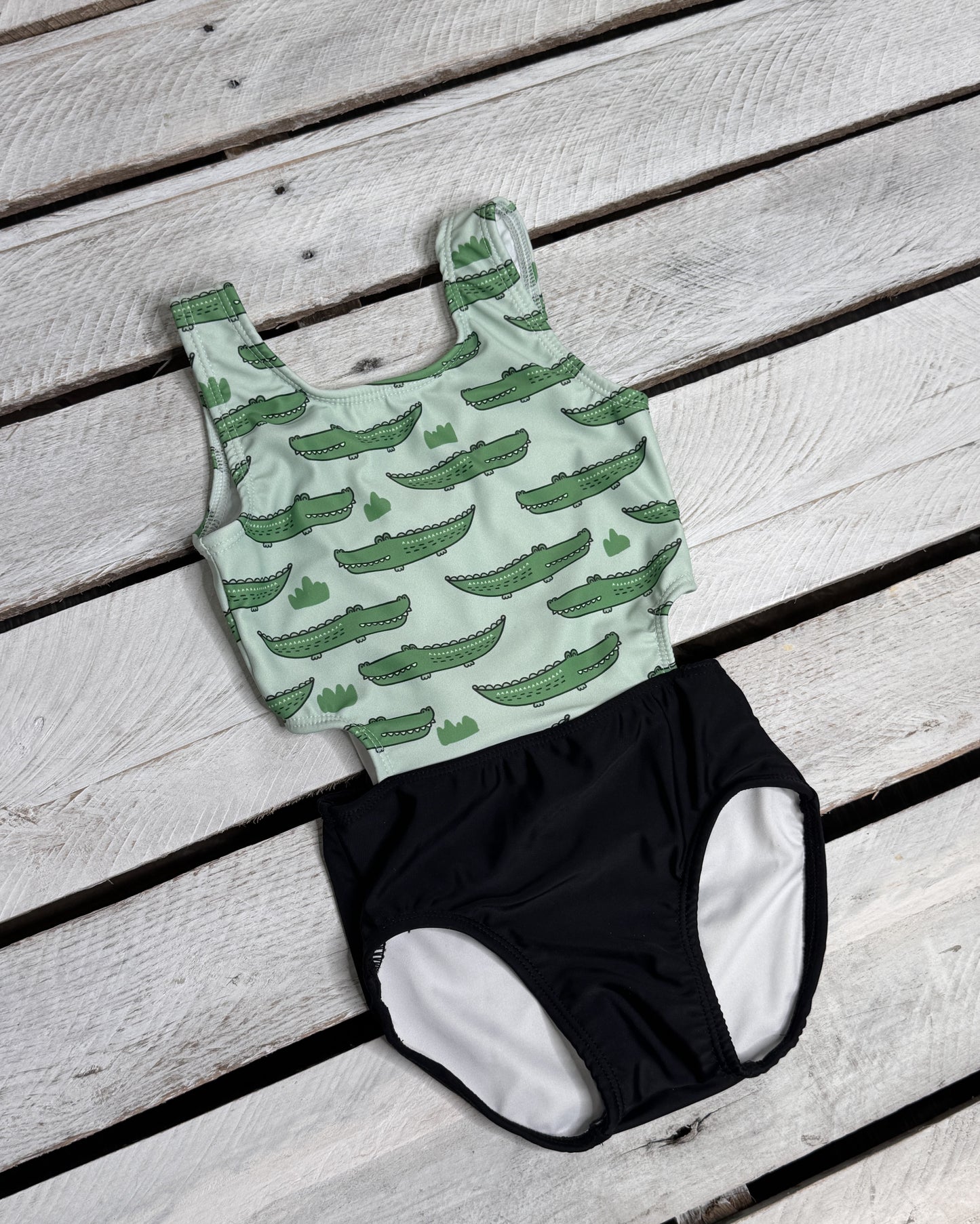 Cute toddler and children's swimwear. Matching sibling swim suit collections. UPF 50 Fabric. Made in the USA!