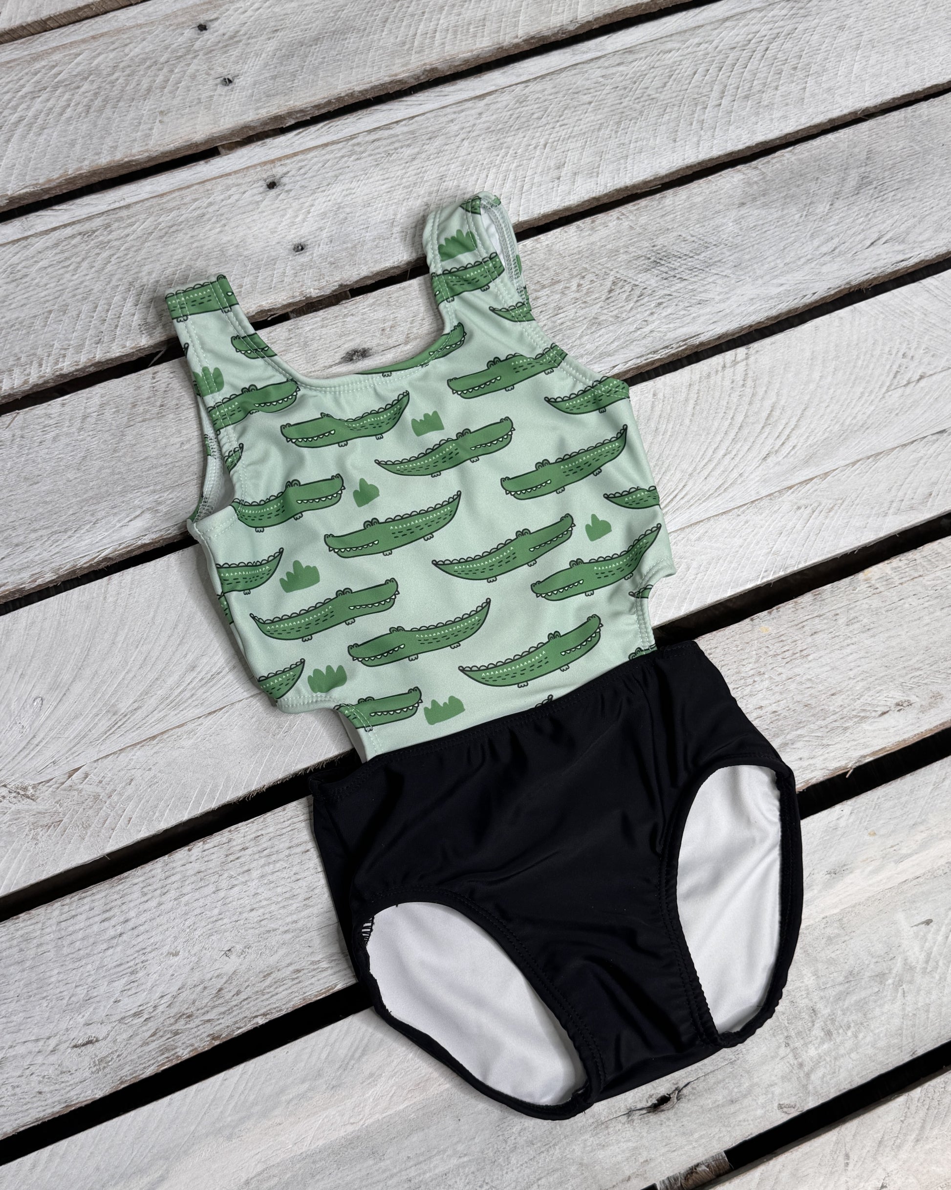 Cute toddler and children's swimwear. Matching sibling swim suit collections. UPF 50 Fabric. Made in the USA!