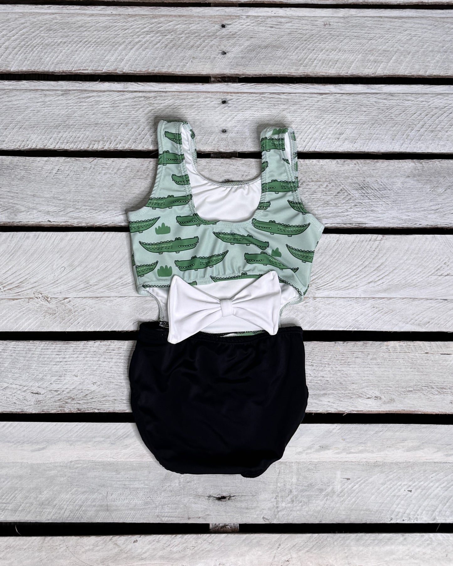 Cute toddler and children's swimwear. Matching sibling swim suit collections. UPF 50 Fabric. Made in the USA!