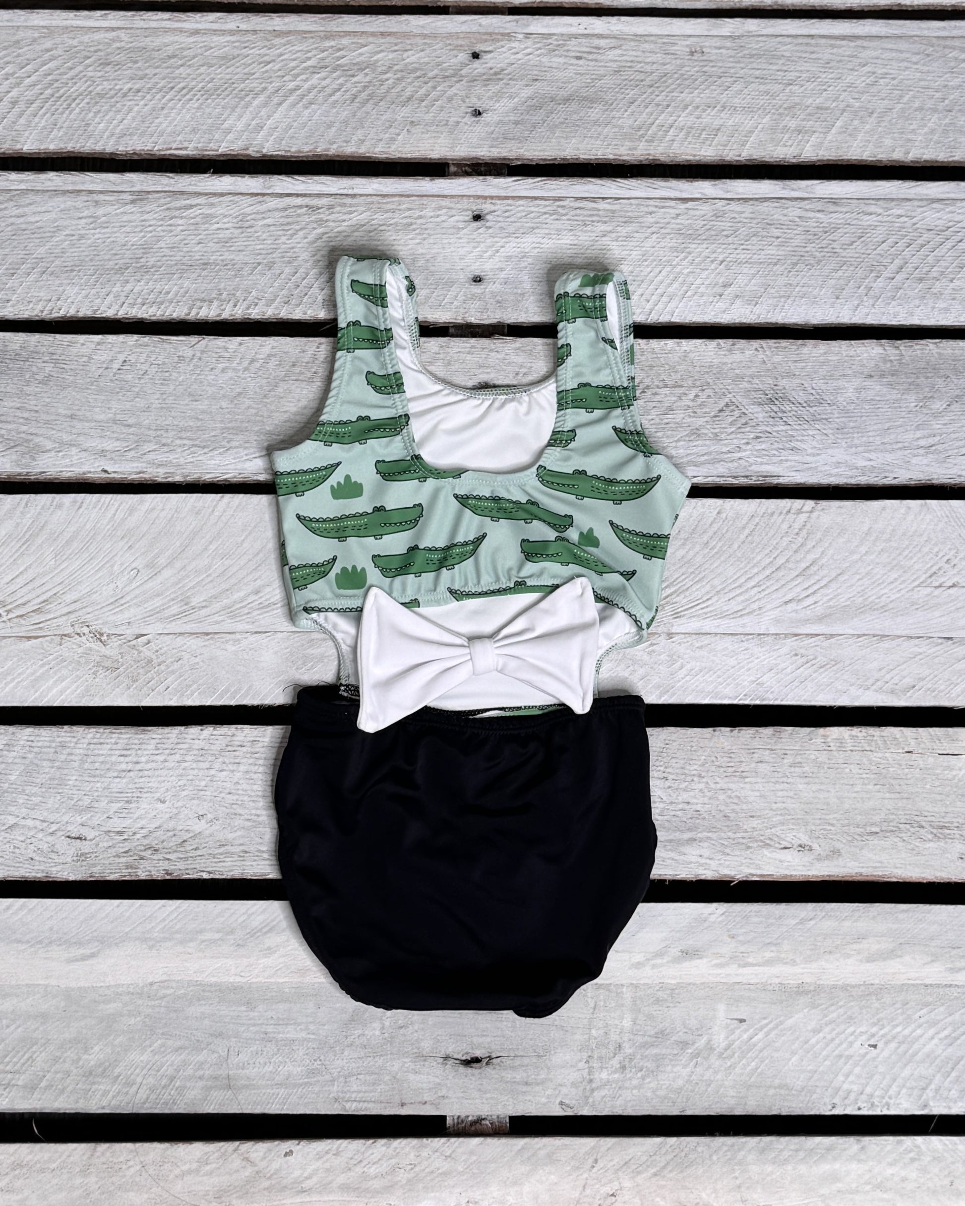Cute toddler and children's swimwear. Matching sibling swim suit collections. UPF 50 Fabric. Made in the USA!