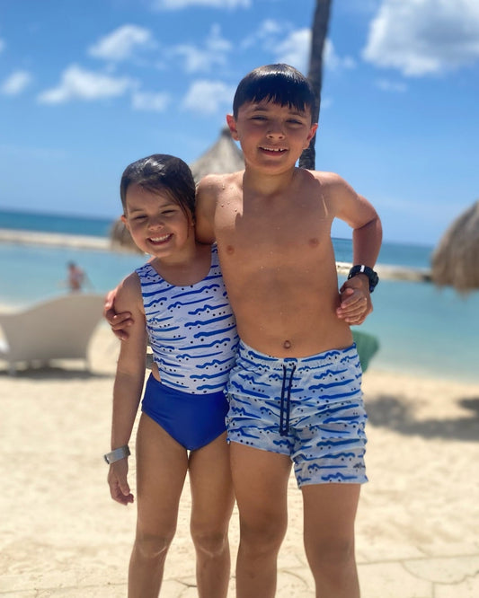 Cute toddler and children's swimwear. Matching sibling swim suit collections. UPF 50 Fabric. Made in the USA!