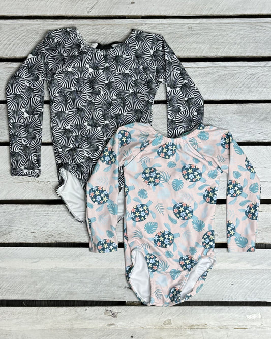 Cute toddler and children's swimwear. Matching sibling swim suit collections. UPF 50 Fabric. Made in the USA!