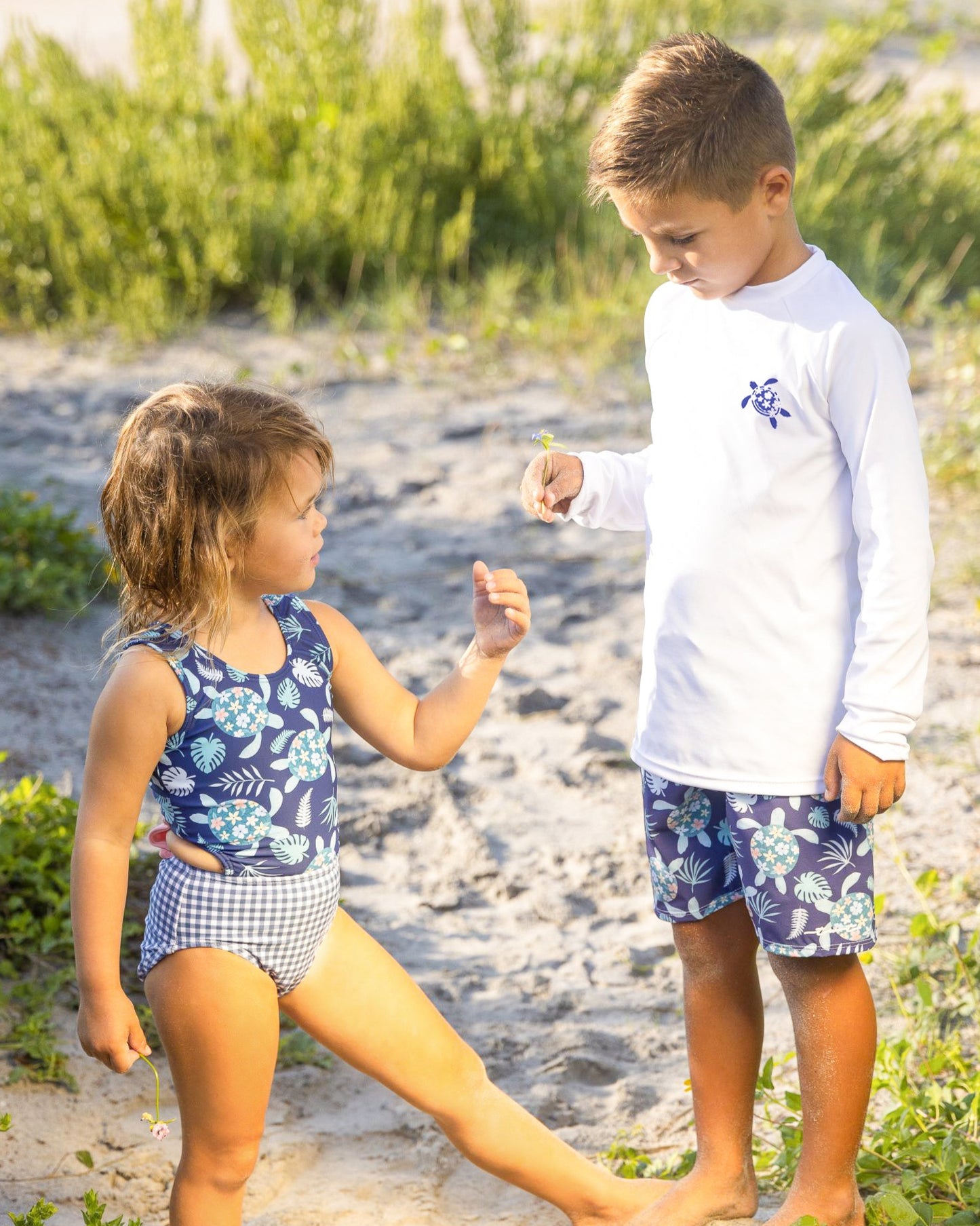 Cute toddler and children's swimwear. Matching sibling swim suit collections. UPF 50 Fabric. Made in the USA!