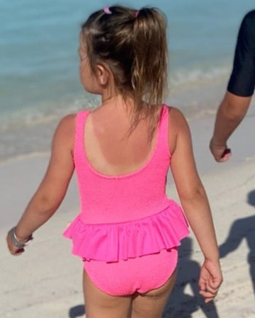 Cute toddler and children's swimwear. Matching sibling swim suit collections. UPF 50 Fabric. Made in the USA!