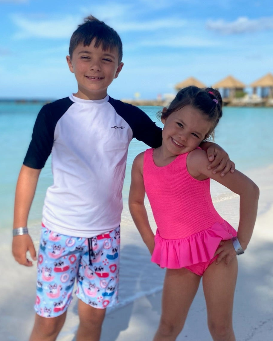 Cute toddler and children's swimwear. Matching sibling swim suit collections. UPF 50 Fabric. Made in the USA!