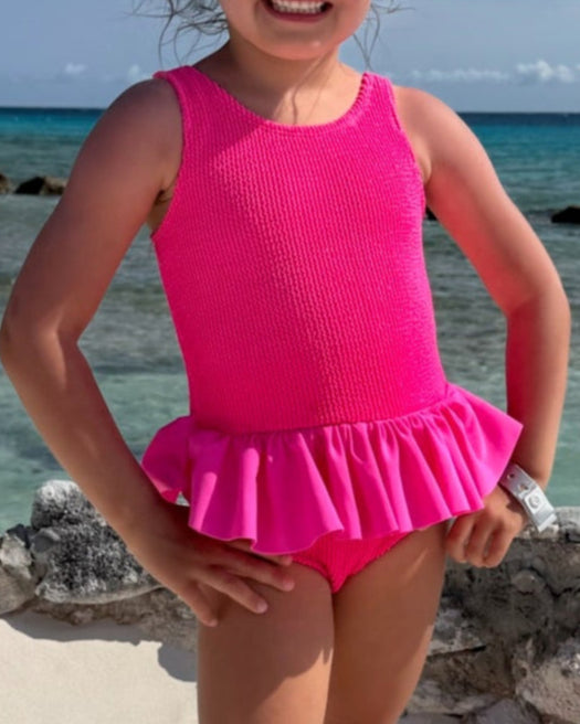 Cute toddler and children's swimwear. Matching sibling swim suit collections. UPF 50 Fabric. Made in the USA!