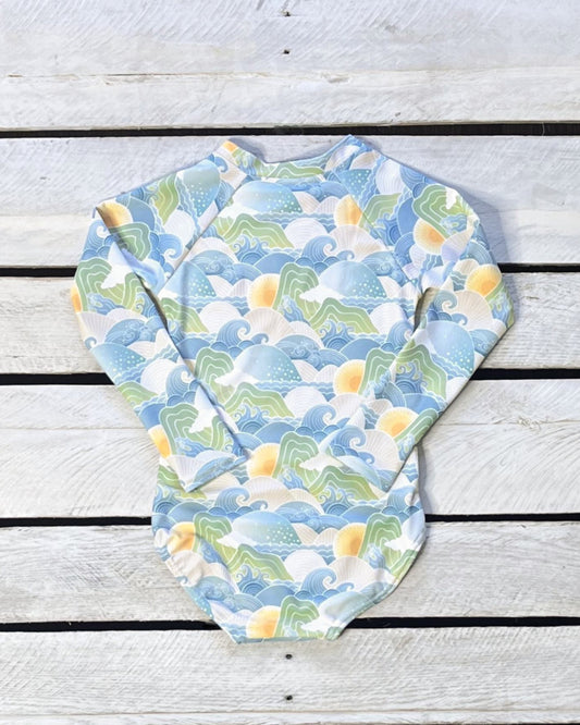 Cute toddler and children's swimwear. Matching sibling swim suit collections. UPF 50 Fabric. Made in the USA!