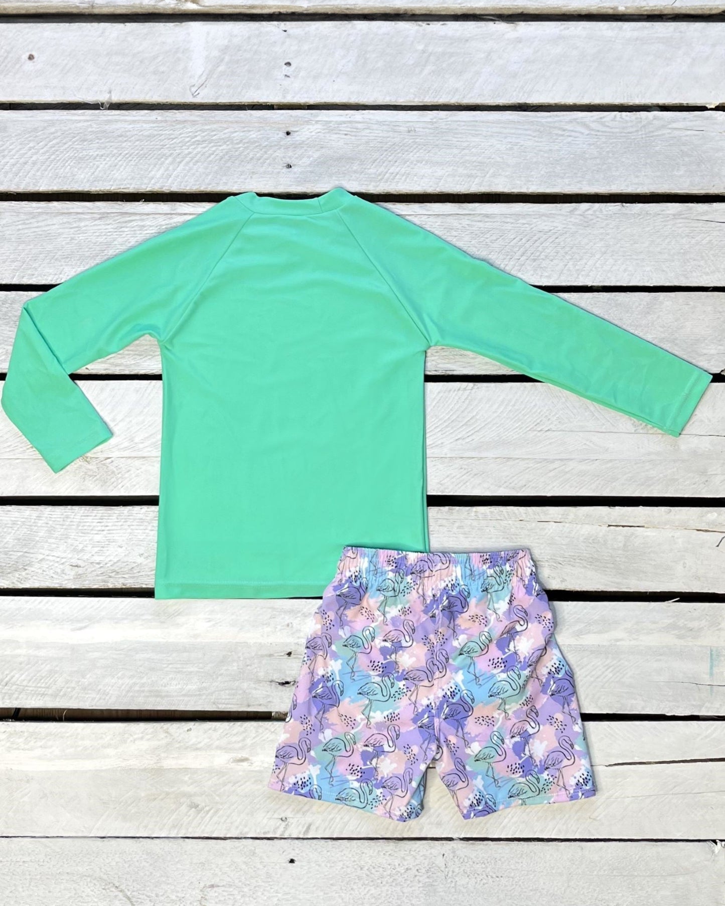 Cute toddler and children's swimwear. Matching sibling swim suit collections. UPF 50 Fabric. Made in the USA!