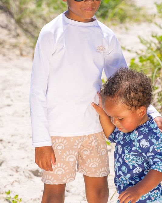 Cute toddler and children's swimwear. Matching sibling swim suit collections. UPF 50 Fabric. Made in the USA!