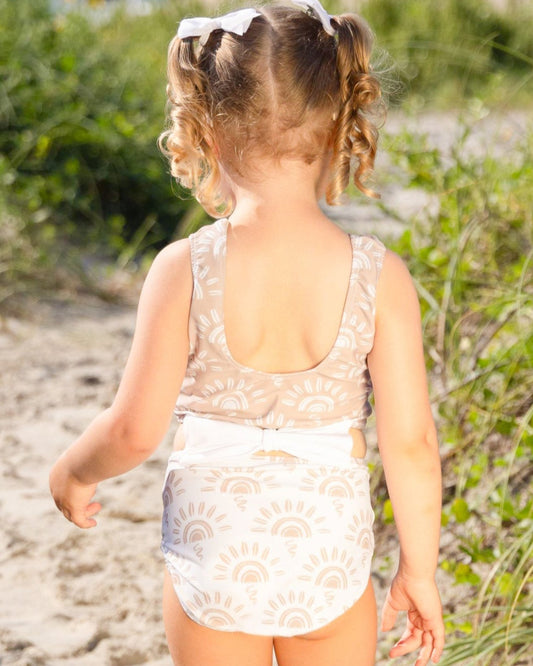 Cute toddler and children's swimwear. Matching sibling swim suit collections. UPF 50 Fabric. Made in the USA!