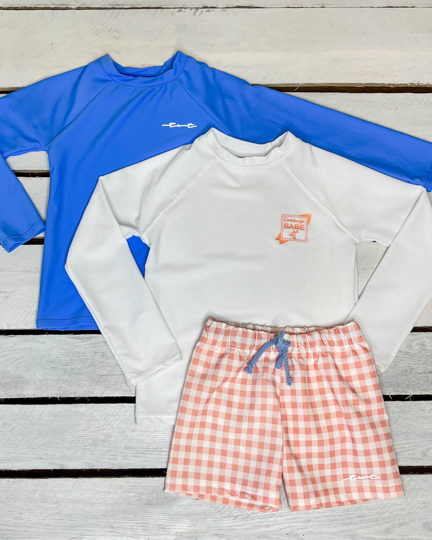 Cute toddler and children's swimwear. Matching sibling swim suit collections. UPF 50 Fabric. Made in the USA!