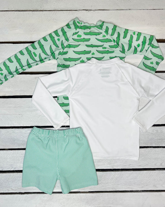 Cute toddler and children's swimwear. Matching sibling swim suit collections. UPF 50 Fabric. Made in the USA!