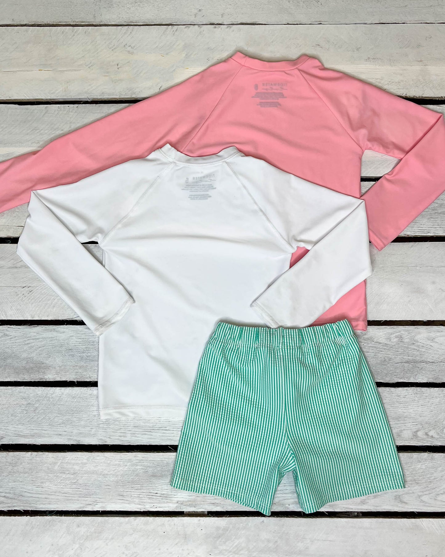 Cute toddler and children's swimwear. Matching sibling swim suit collections. UPF 50 Fabric. Made in the USA!