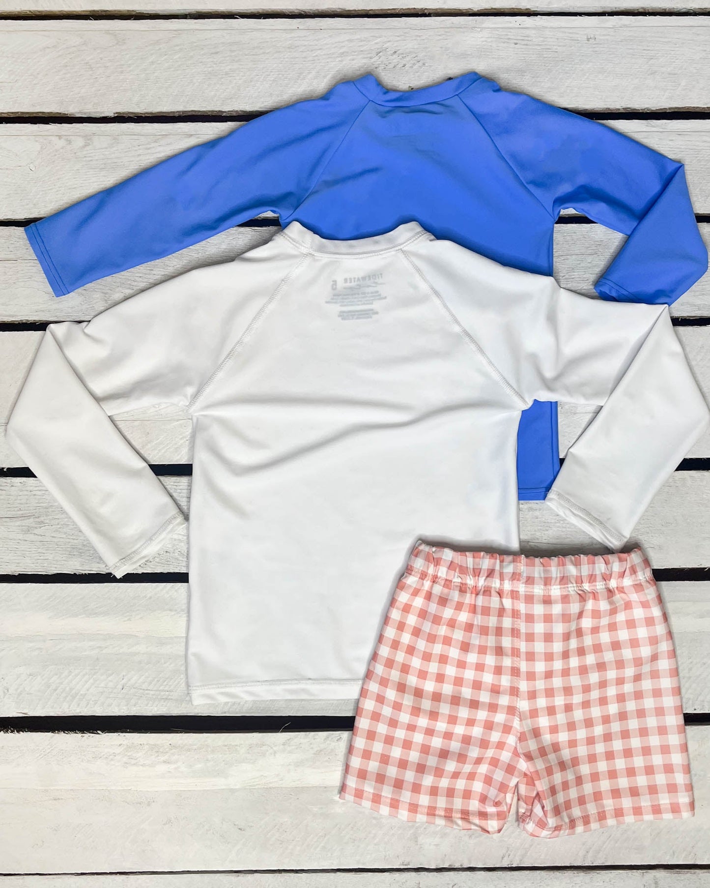 Cute toddler and children's swimwear. Matching sibling swim suit collections. UPF 50 Fabric. Made in the USA!