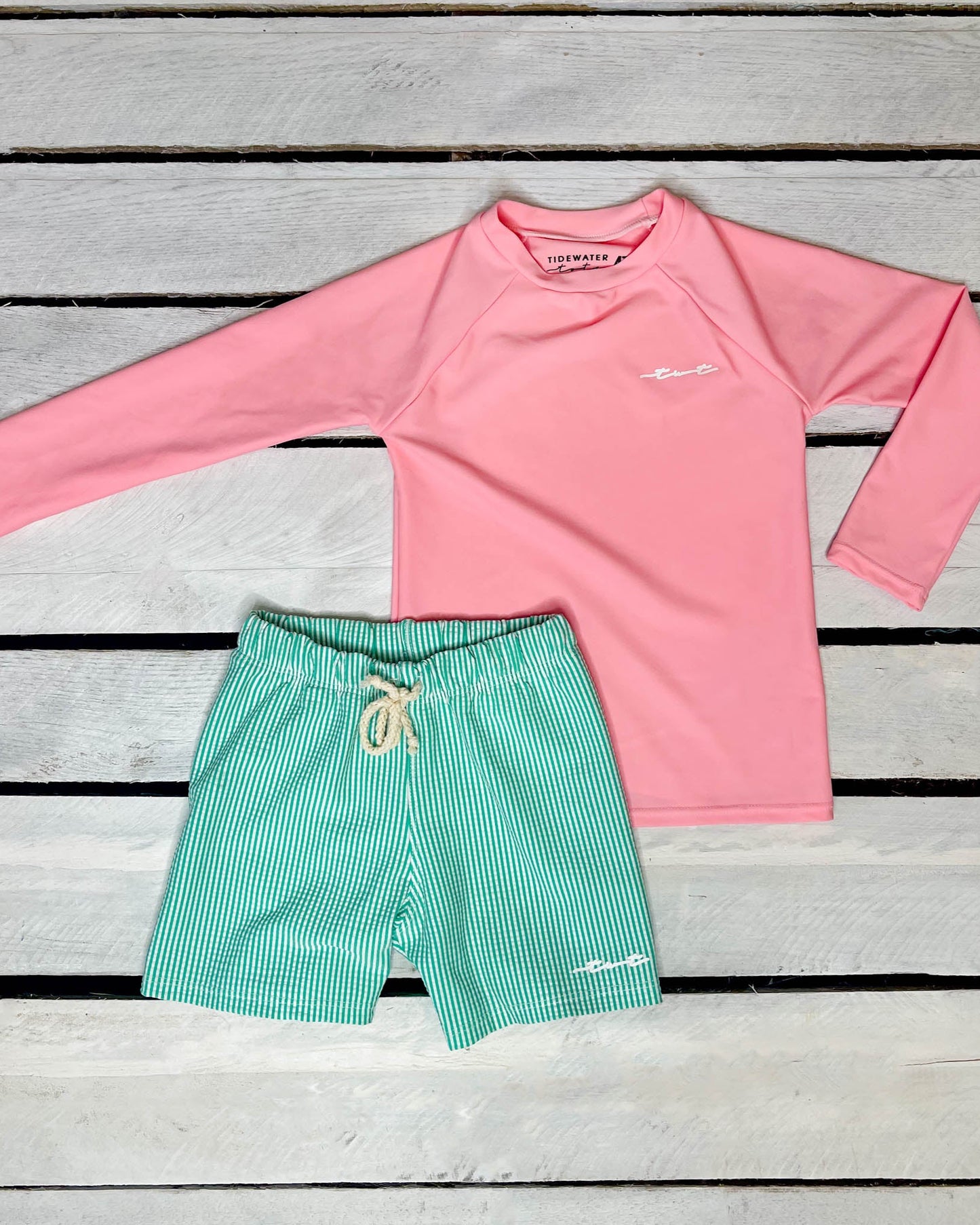 Cute toddler and children's swimwear. Matching sibling swim suit collections. UPF 50 Fabric. Made in the USA!