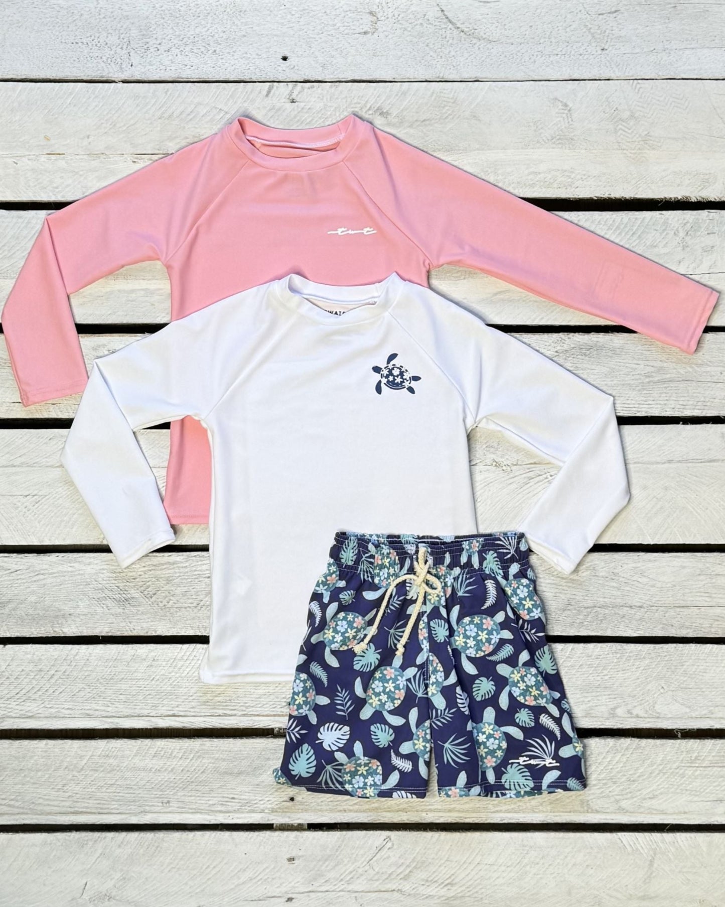 Cute toddler and children's swimwear. Matching sibling swim suit collections. UPF 50 Fabric. Made in the USA!