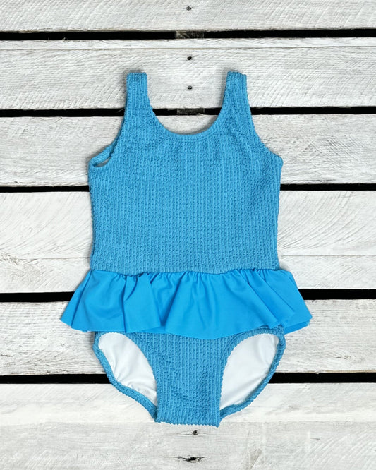 Cute toddler and children's swimwear. Matching sibling swim suit collections. UPF 50 Fabric. Made in the USA!