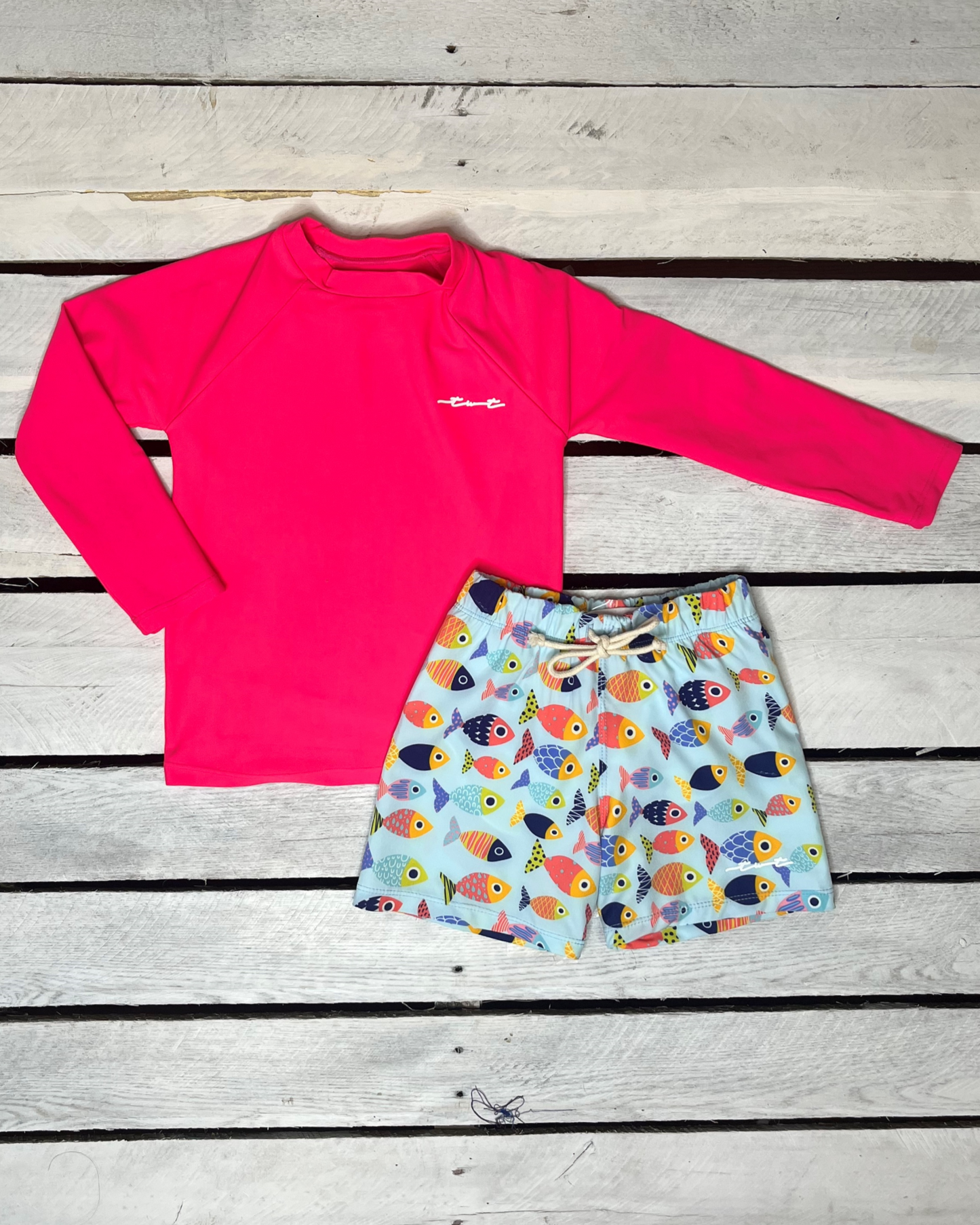 Cute toddler and children's swimwear. Matching sibling swim suit collections. UPF 50 Fabric. Made in the USA!