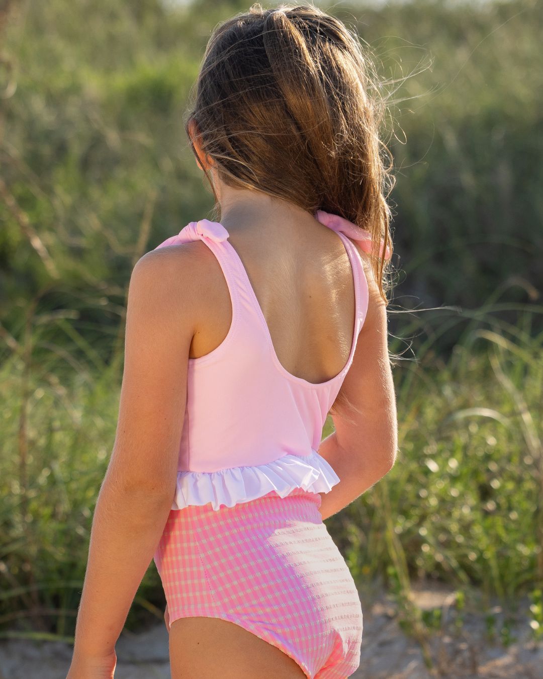 Cute toddler and children's swimwear. Matching sibling swim suit collections. UPF 50 Fabric. Made in the USA!