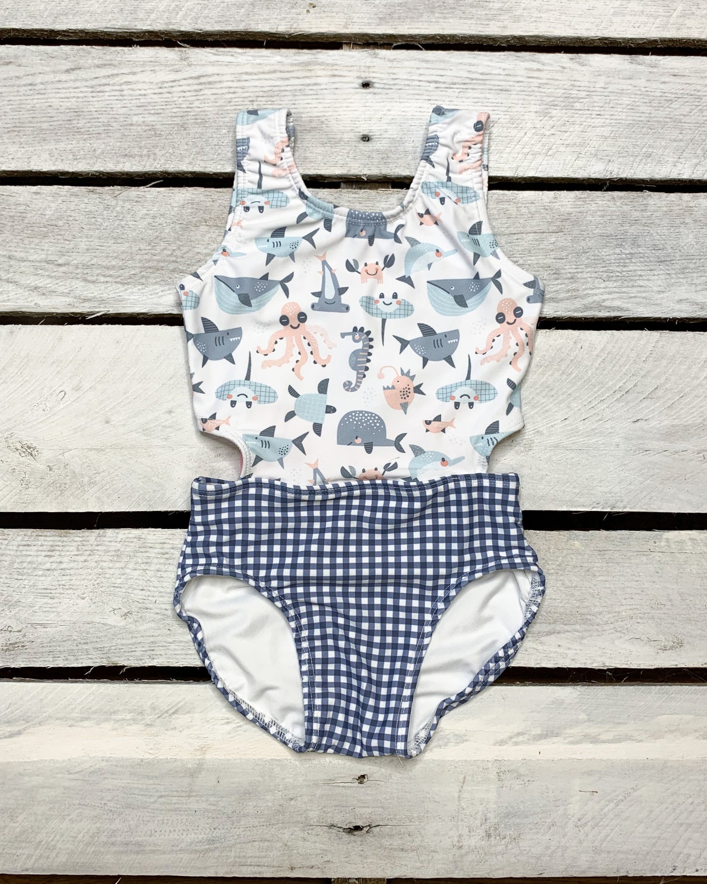 Cute toddler and children's swimwear. Matching sibling swim suit collections. UPF 50 Fabric. Made in the USA!