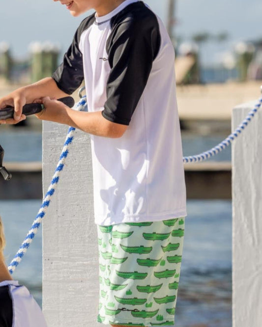 Cute toddler and children's swimwear. Matching sibling swim suit collections. UPF 50 Fabric. Made in the USA!