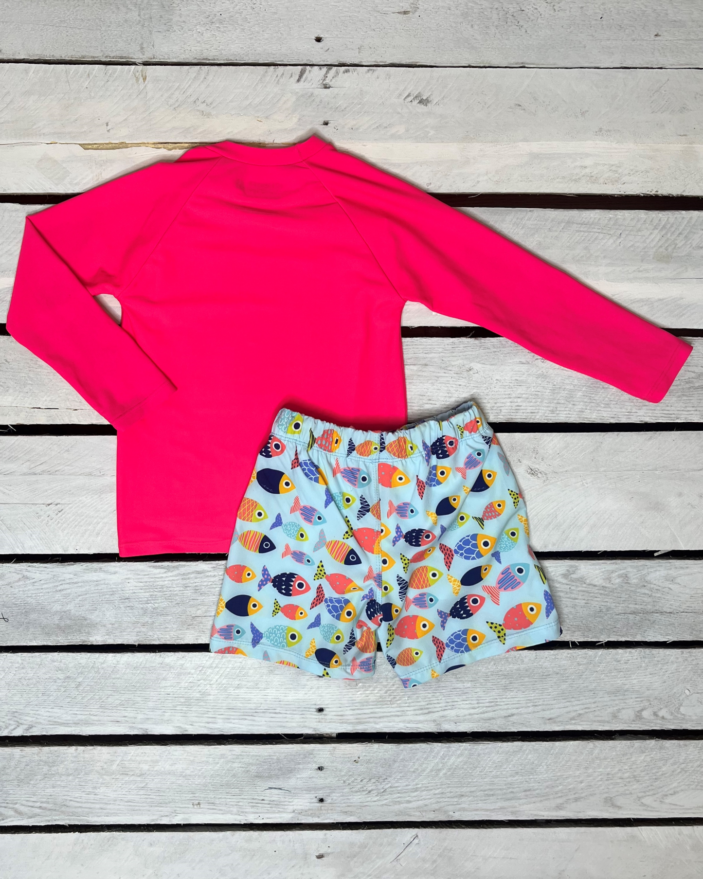 Cute toddler and children's swimwear. Matching sibling swim suit collections. UPF 50 Fabric. Made in the USA!