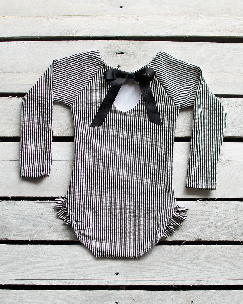 Cute toddler and children's swimwear. Matching sibling swim suit collections. UPF 50 Fabric. Made in the USA!