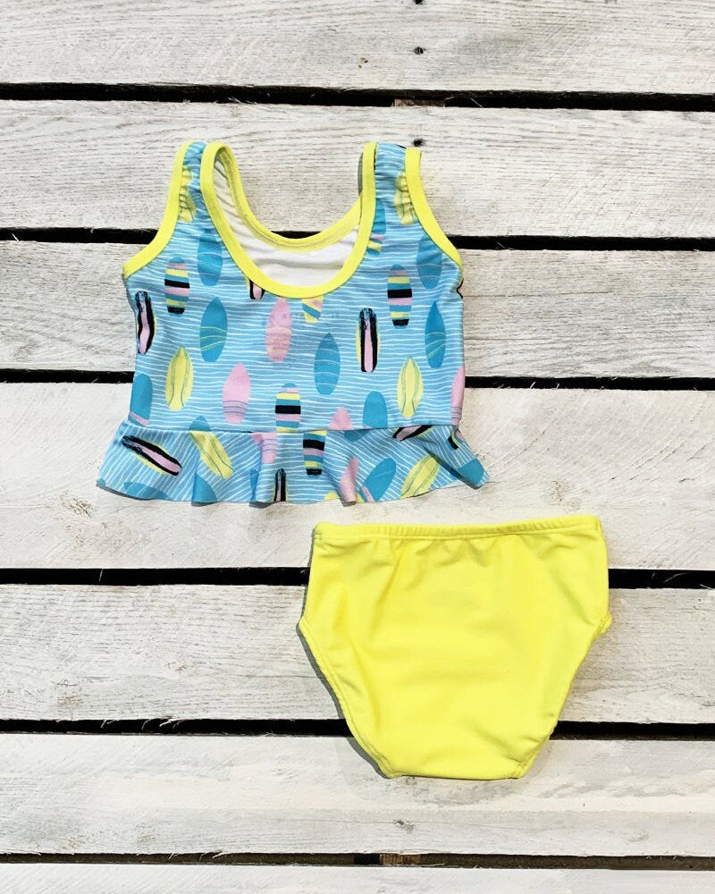 Cute toddler and children's swimwear. Matching sibling swim suit collections. UPF 50 Fabric. Made in the USA!