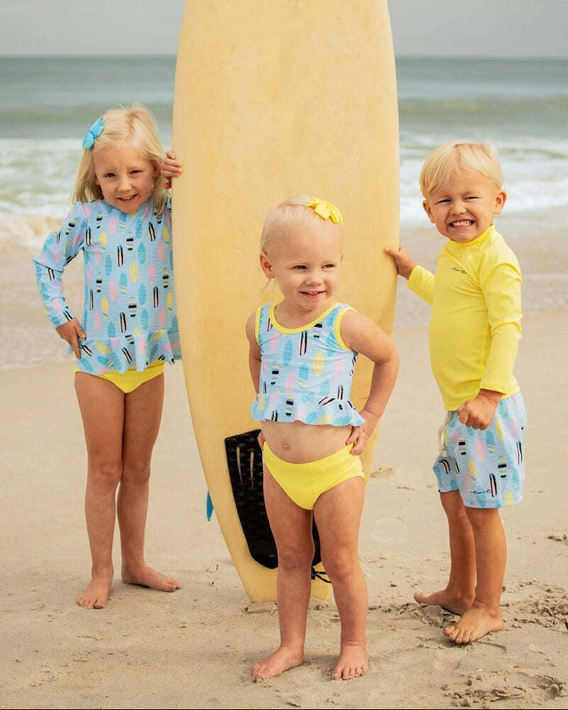 Cute toddler and children's swimwear. Matching sibling swim suit collections. UPF 50 Fabric. Made in the USA!