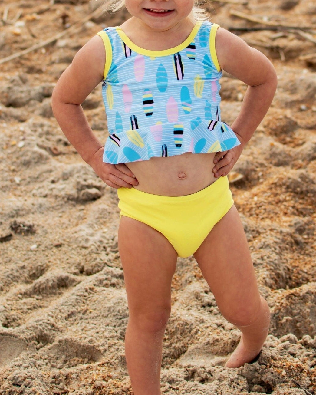 Cute toddler and children's swimwear. Matching sibling swim suit collections. UPF 50 Fabric. Made in the USA!