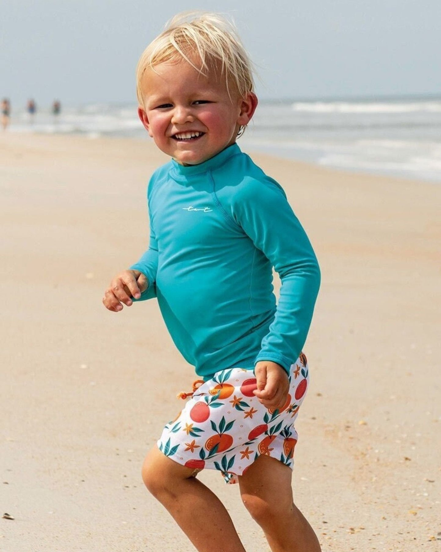 Cute toddler and children's swimwear. Matching sibling swim suit collections. UPF 50 Fabric. Made in the USA!
