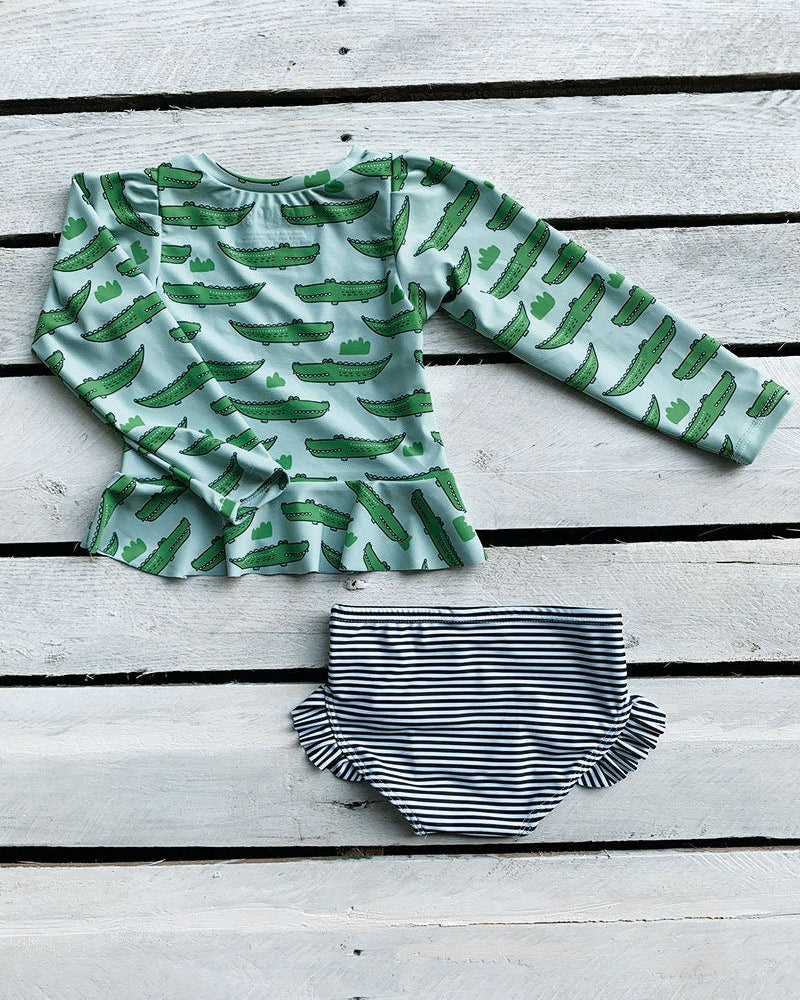 Cute toddler and children's swimwear. Matching sibling swim suit collections. UPF 50 Fabric. Made in the USA!