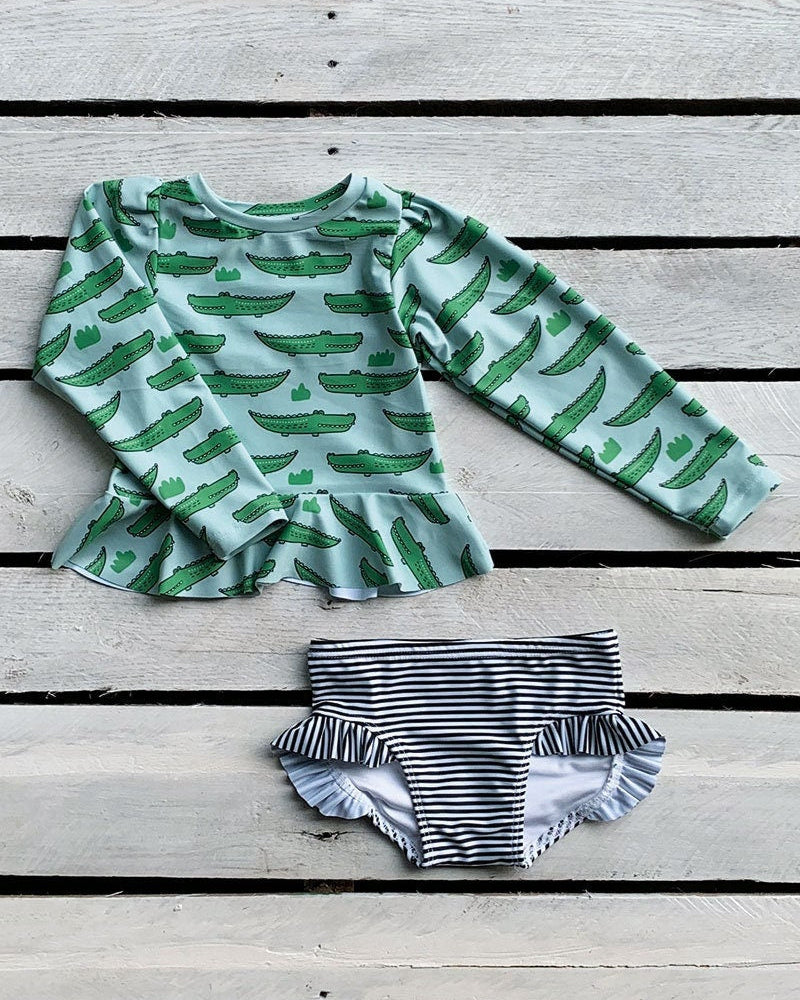 Cute toddler and children's swimwear. Matching sibling swim suit collections. UPF 50 Fabric. Made in the USA!