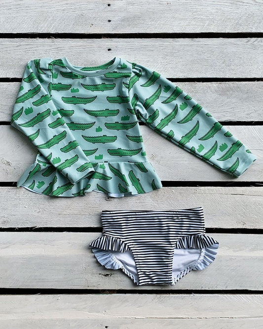 Cute toddler and children's swimwear. Matching sibling swim suit collections. UPF 50 Fabric. Made in the USA!